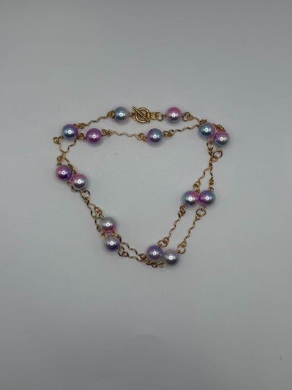 25" pink, blue, and white bead necklace