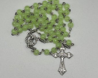 19" green glass bead rosary with Madonna center and grapes crucifix
