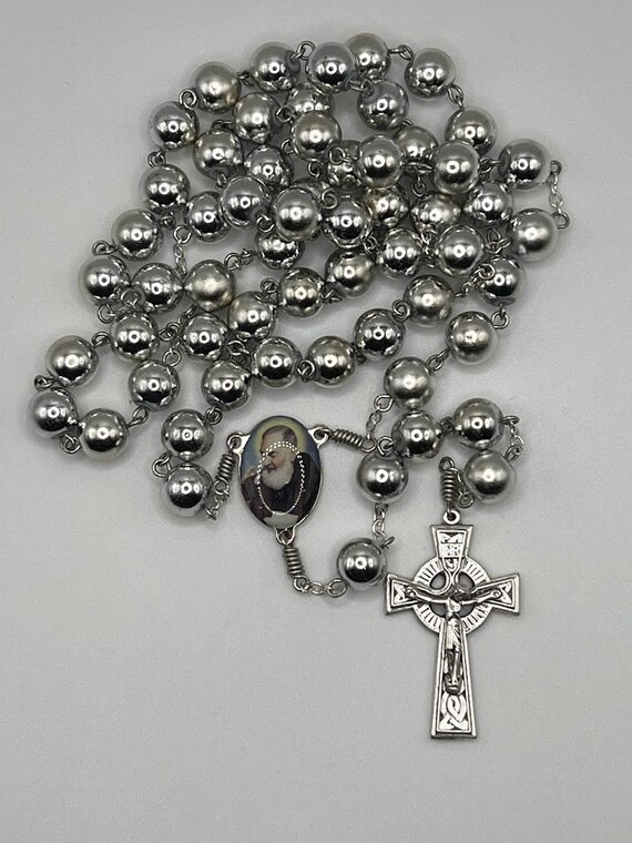 25" silver bead rosary with Padre Pio center and Celtic crucifix