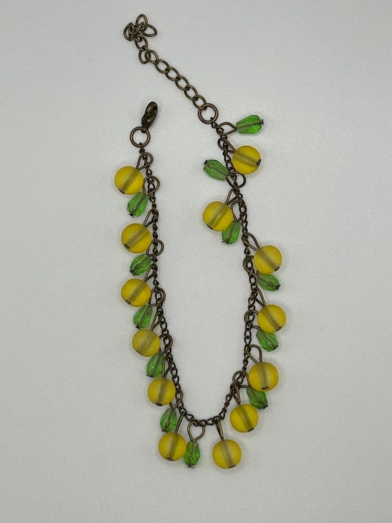 8" yellow and green bead bracelet