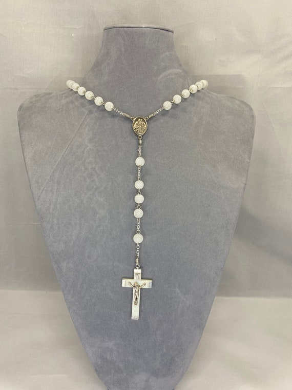 22.5" white glass bead rosary with confirmation center and glow in the dark crucifix
