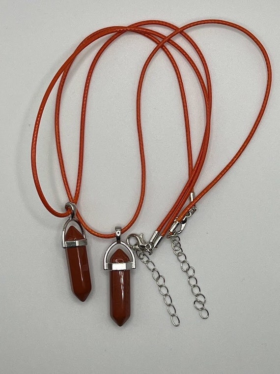 Orange glass pendant on 18" orange cord with silver lobster clasp and 2" chain extender