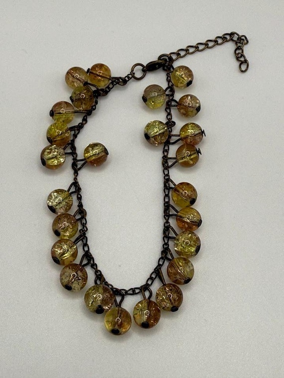 8" brown and yellow crackle glass charm style bracelet
