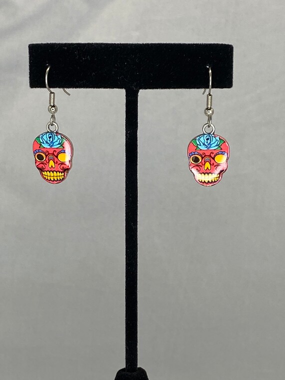 Enamel skull dangle earrings