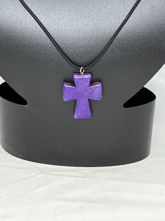 20" howlite cross on black rubber cord