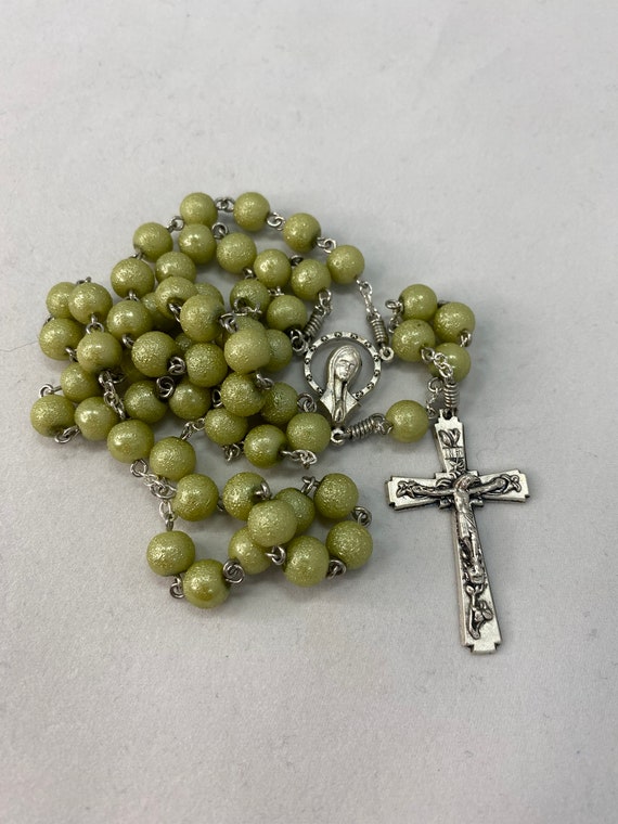 21.5" textured luster green bead rosary with Madonna center and lily crucifix