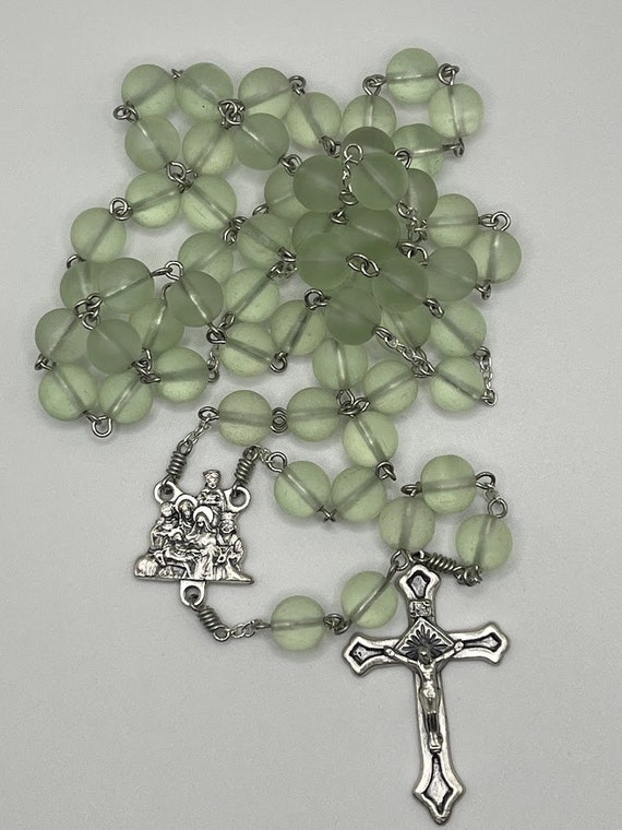 26" glow in the dark glass bead rosary with Nativity center and raised edges crucifix