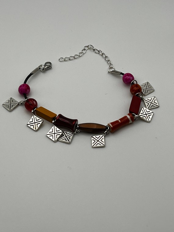 7" fire colored beads and diamond drop bracelet