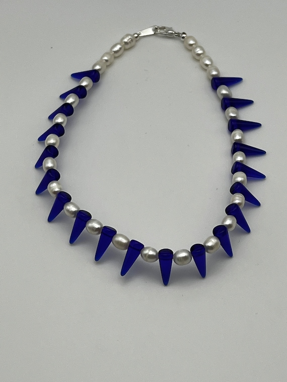 12"blue glass spike and pearl bracelet