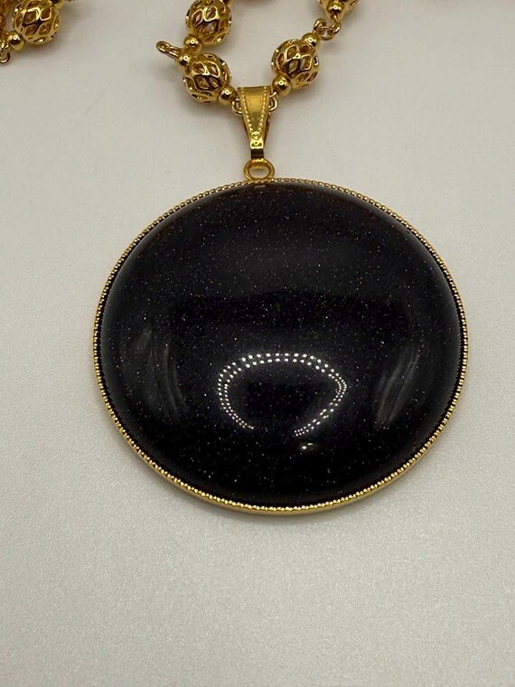 28.5" blue goldstone pendant necklace