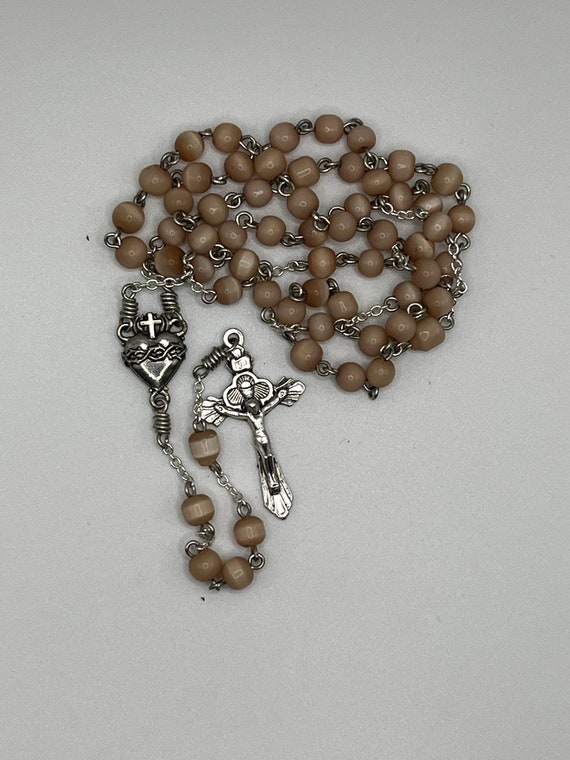 19" tan catseye bead rosary with Sacred Heart center and chalice crucifix