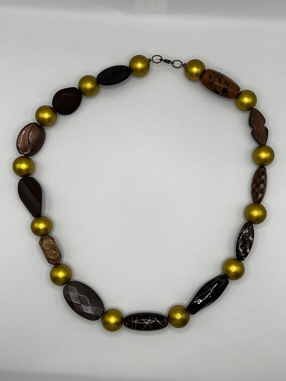 23" gold and brown acrylic shaped necklace