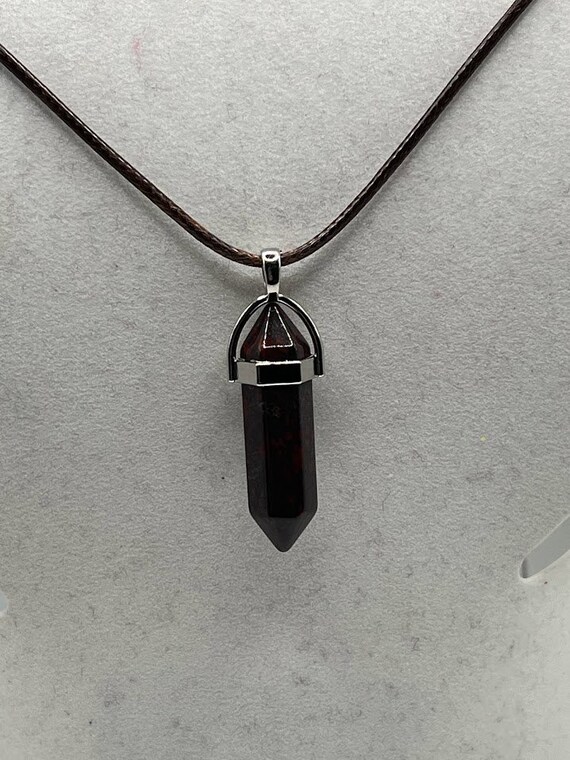 18" brown glass pendant on brown cord with silver lobster clasp and 2" chain extender