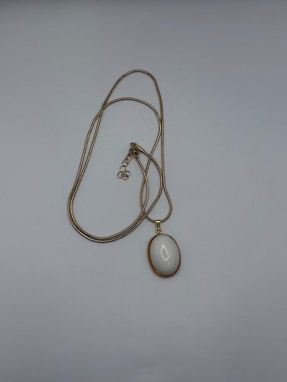 24" snowy quartz pendant on gold
