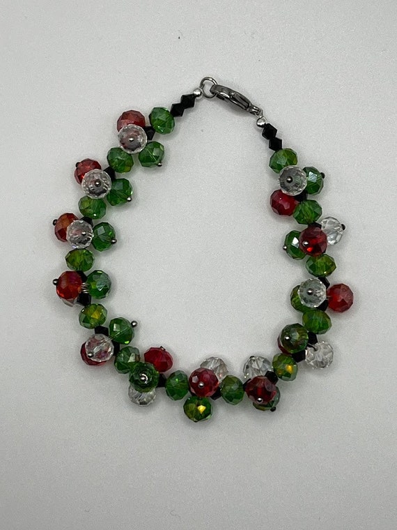 9" red, clear, and green rondelle bracelet