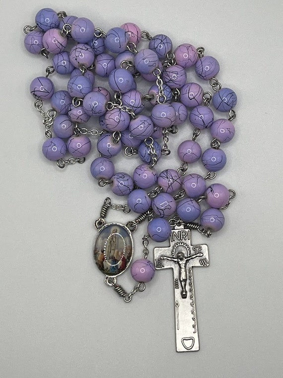 26" pink/purple bead rosary with enamel Fatima center and penal Irish crucifix