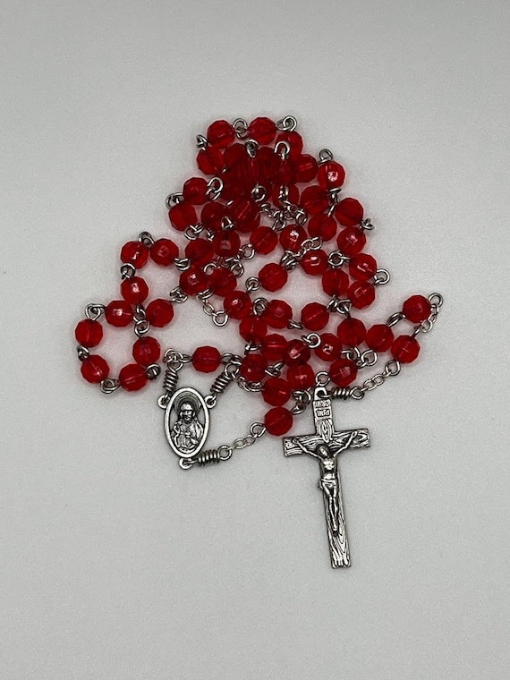 20.5" red acrylic bead rosary with Sacred Heart center and woodgrain crucifix