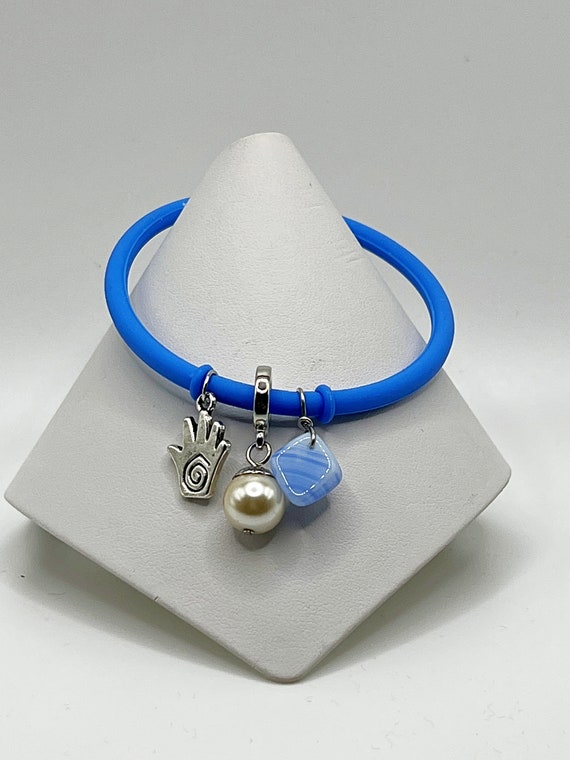 7.5" blue rubber cord charm bracelet
