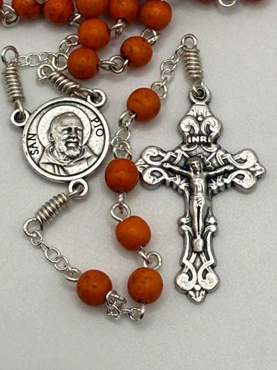 26.5" orange howlite bead 7 decade crown rosary with Padre Pio relic center and filigree crucifix