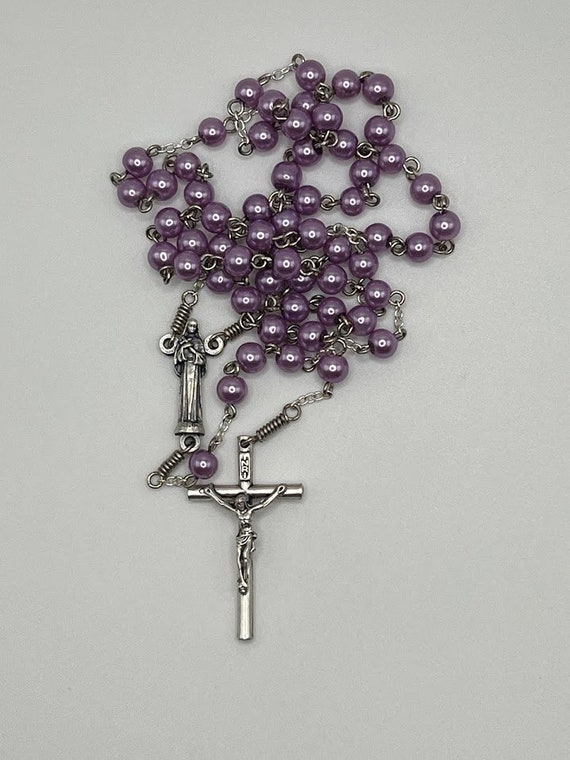 19.5" violet pearl bead rosary with St. Rita center and round crucifix