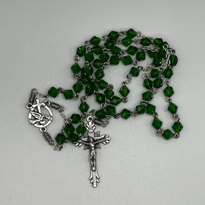 19&quot; green glass crystal bead rosary with cross, bird, and heart center and sunburst crucifix