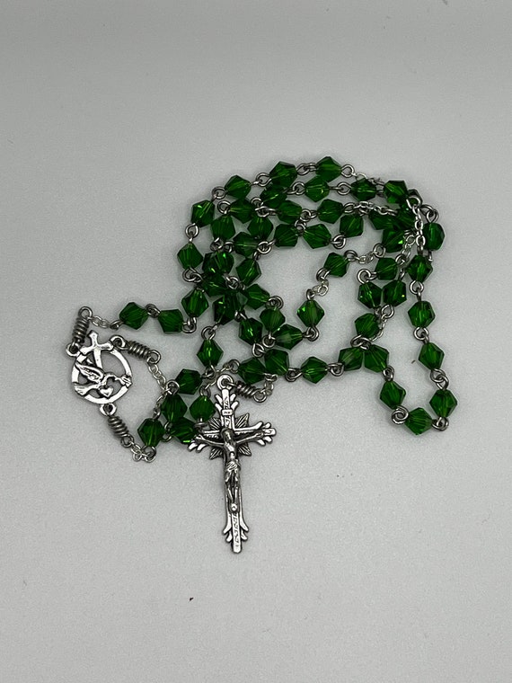 19" green glass crystal bead rosary with cross, bird, and heart center and sunburst crucifix