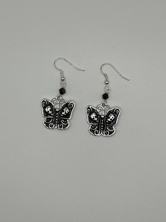 Black enamel butterfly drop earrings