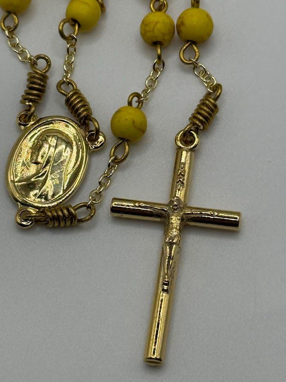 21" yellow howlite bead rosary with Madonna/Sacred Heart center