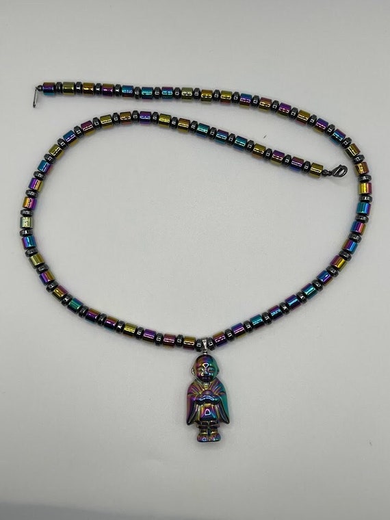 24" dark rainbow hemalyke necklace with Buddha drop