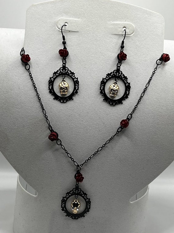 Framed skull necklace and earring set