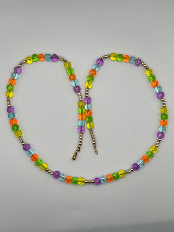 27" multi colored glass bead necklace with gold accents