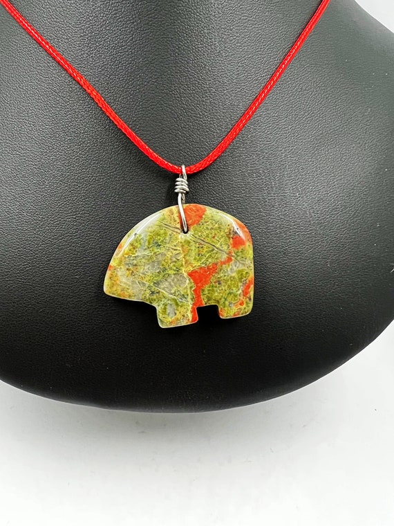 18" unakite carved bear pendant on cord
