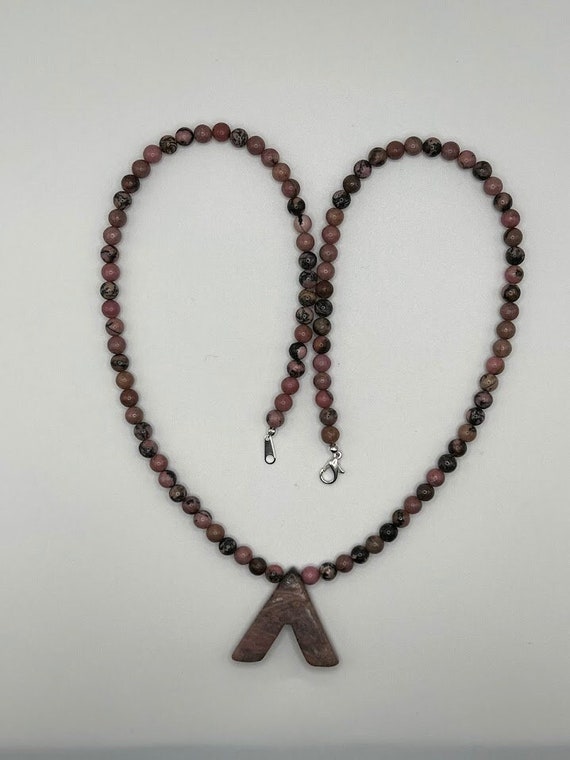 24.5" rhodonite cross beaded necklace