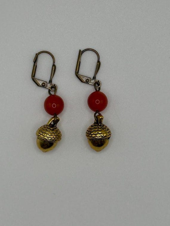 Gold acorn drop earring