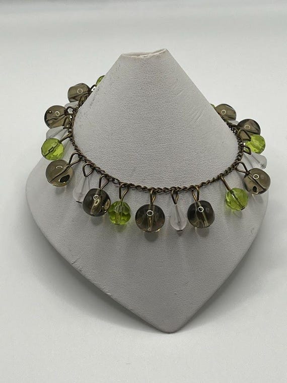 8" green, smoke, and white bead bracelet