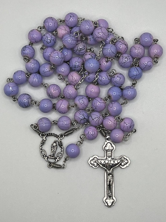 25.5" purple/pink bead rosary with Good Shepard center and ivy crucifix