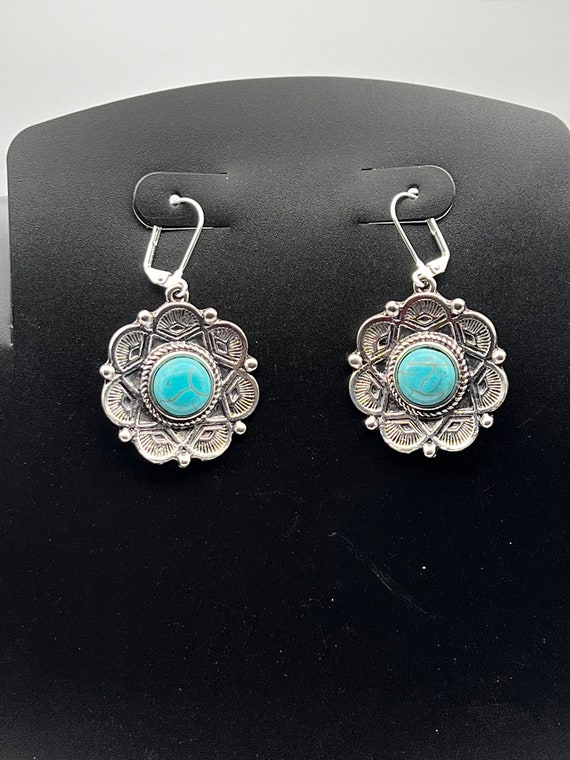 Silver ornate drop earrings