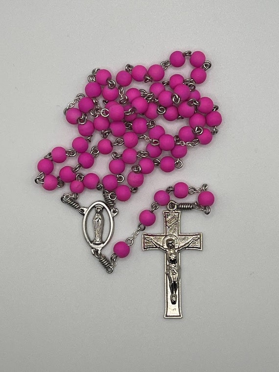 18.5" pink rubber coated bead rosary with Madonna center and mission crucifix