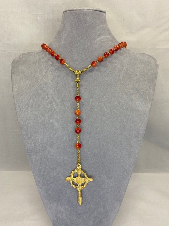 22.5" red agate bead rosary with gold chalice center and crown of thorns and nails crucifix