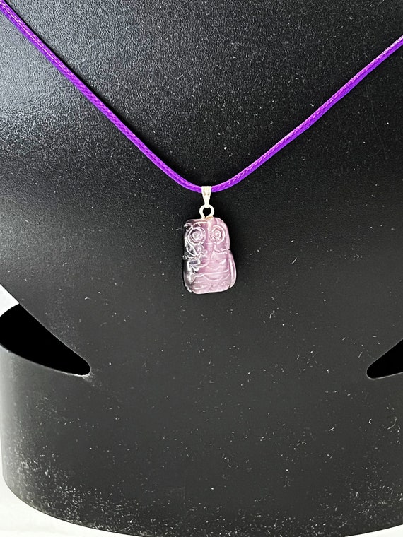 18" purple cay eye pendant on purple cord