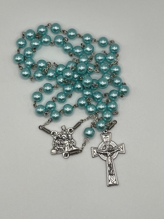 23" light blue pearl rosary with Nativity center and Celtic crucifix