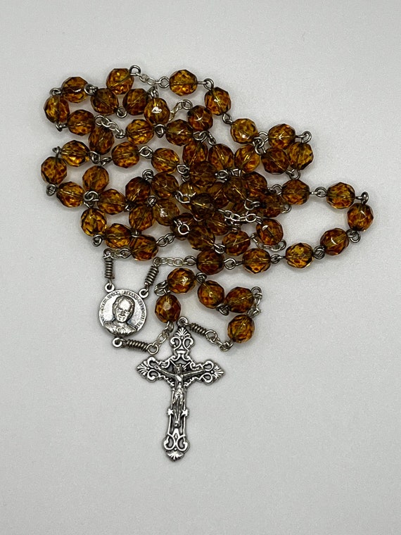 23" tortoise glass bead rosary with Don Bosco center