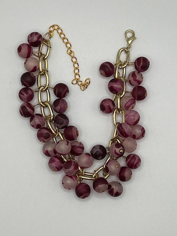 8" wine colored beads on gold chain bracelet