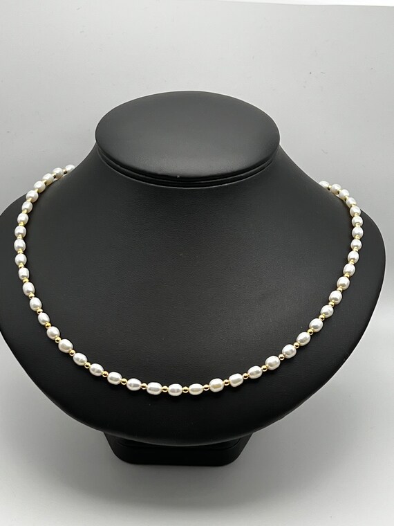 21" pearl and gold necklace