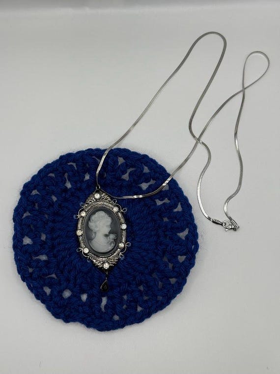 24" blue crocheted flat flower and cameo pendant necklace