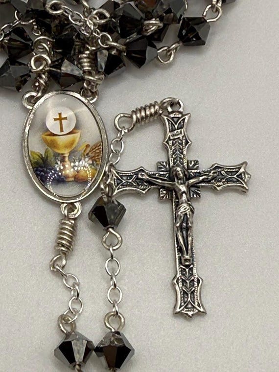 27.5" black crystal bead 7 decade crown rosary with Holy Eucharist center and ornate crucifix