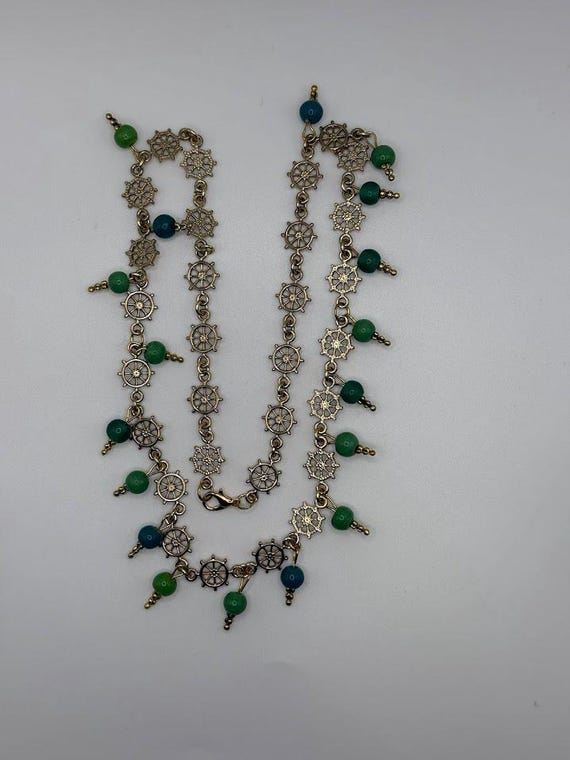 23" ship's wheel and green glass bead necklace
