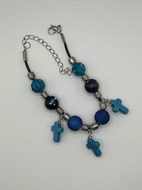 7" blue bead and cross bracelet