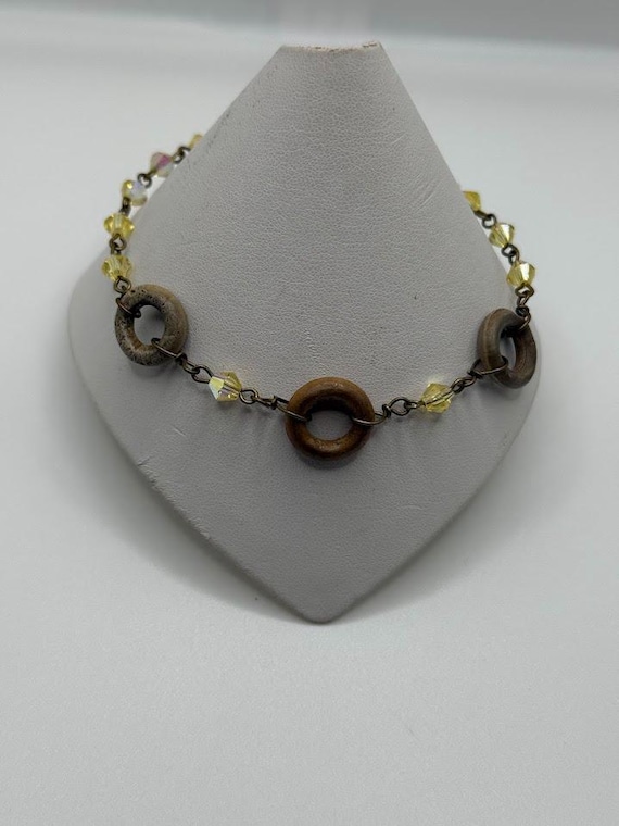 9.5" crystal and wood bead bracelet