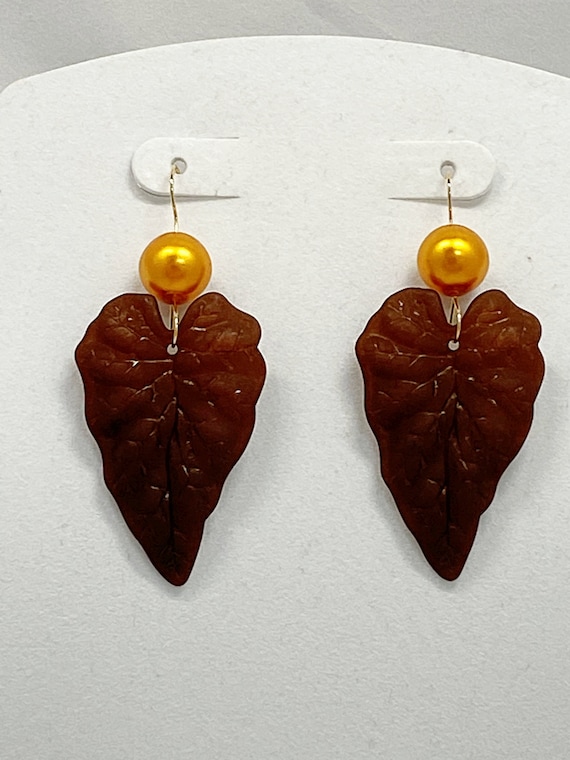 3" orange pearl and brown leaf earrings